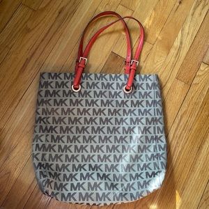 Tan and orange Michael Kors bag